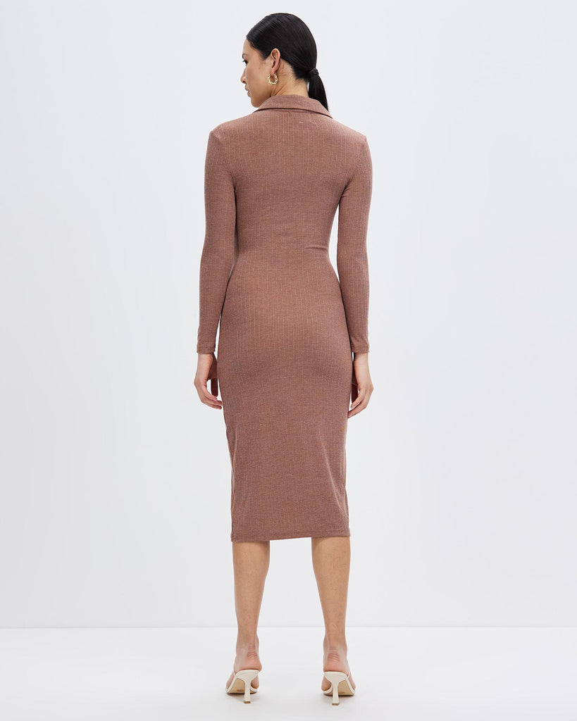 A brown dress with a high slit design, revealing the beauty of legs.