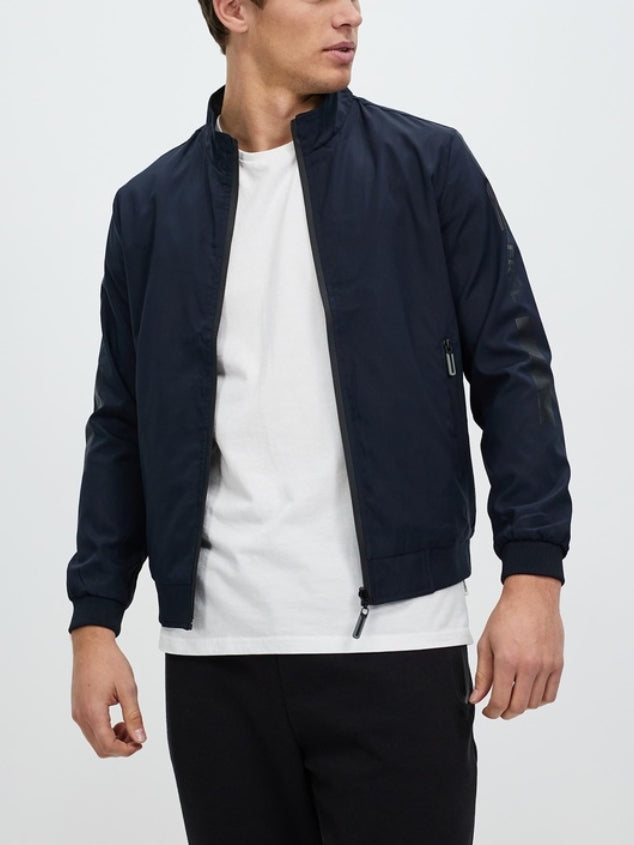 The double-sided men's jacket is made of high-quality windproof and waterproof fabric