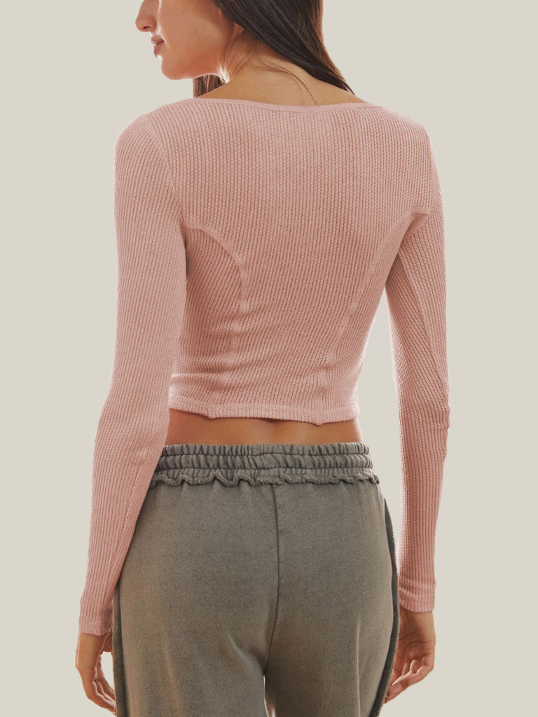 A pink long sleeved top for women